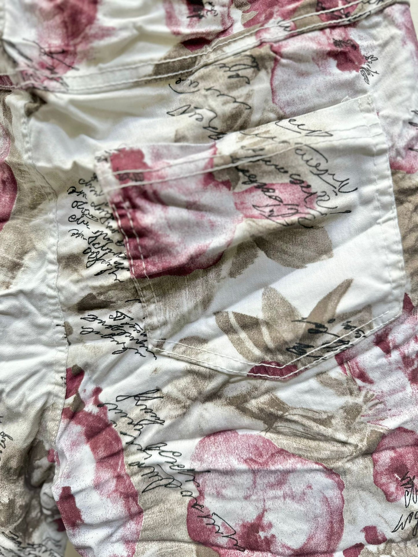 The Cursive Lettering With Floral Print Joggers- Anicoletta's Boutique | Fashion Forward Luxury Women's Clothing