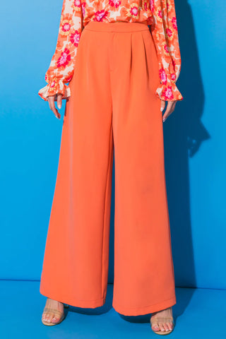 The Good Vibes Orange Palazzo Pants- Anicoletta's Boutique | Fashion Forward Luxury Women's Clothing