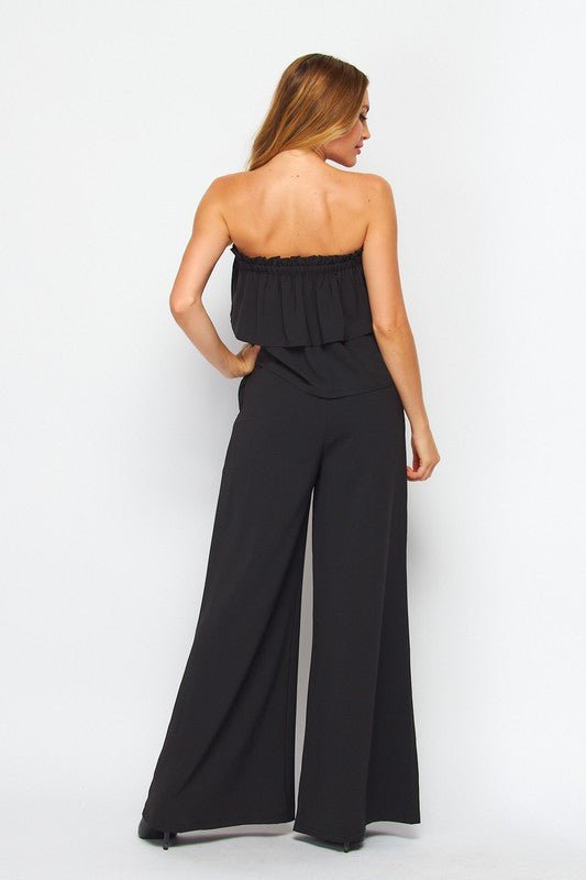 The Black Retro Ruffle Jumpsuit- Anicoletta's Boutique | Fashion Forward Luxury Women's Clothing